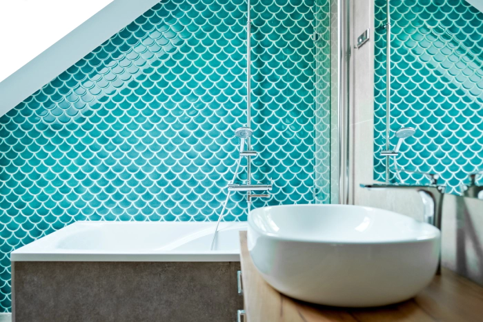 natural shades of tiles white bathtub surround large window in the bathroom floor tiles